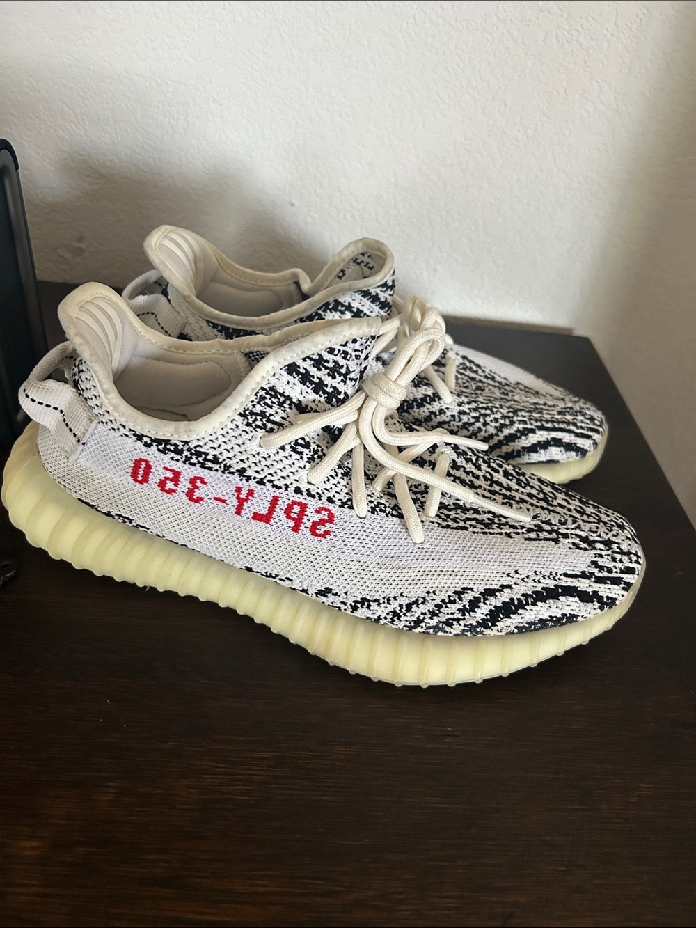 Yeezy Zebra Knit Sneakers with Red Script and Cream Sole